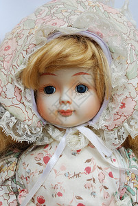 粉色的盯裙子复古瓷娃的肖像背景图片