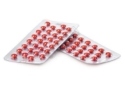 两盒红色药片背景图片