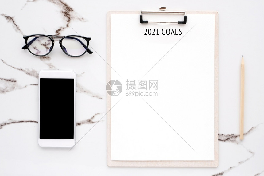 剪贴板201年目标即空白纸上的201年目标并有文字和智能手机的复制空间白色大理石背景空屏幕新年的目标是在商业背景上取得成功笔记动图片