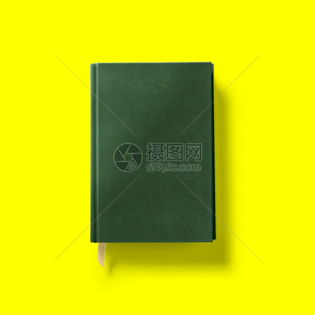 背回到学校的概念硬封面暗绿书前线紧隔离在黄色上简单的收藏绿色图片