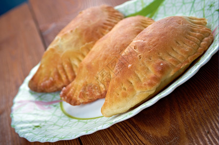 肉馅卷饼在拉丁美洲国西南部和东亚分地区的许多烘烤或油炸的阿根廷肉馅面包或糕点欧洲团传统的图片