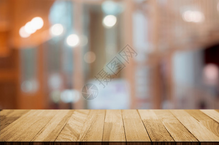 餐饮咖啡厅背景中灰色的空木板桌展示超过酒吧图片