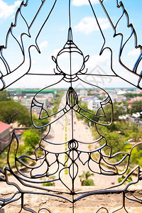旅行窗户象征老挝首都Patuxay万象纪念碑的一幅佛像美丽景色的窗口图片