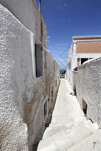 垂直的地中海希腊圣托里尼岛Oia村狭窄街道希腊奥亚村狭小街道蓝色的图片