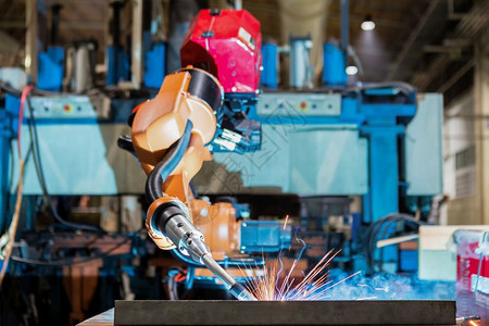 电子产品工业机器人在汽车厂的部分焊接组装服务工业的图片