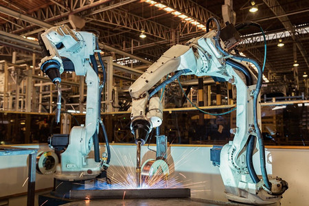 团队机器人在汽车厂焊接电子产品生机械图片