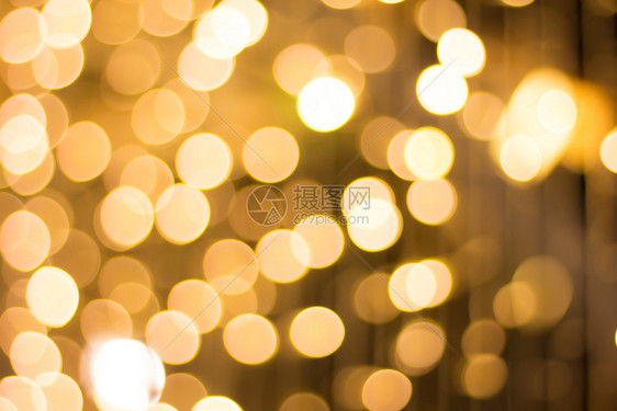 白色的金子散焦在节日活动期间背景模糊不清夜里布基赫语模糊图片