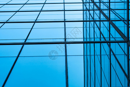 摩天大楼空现代未来主义玻璃建筑抽象背景的透视图办公玻璃建筑外部在商业透明玻璃中的反射公司玻璃窗质地图片