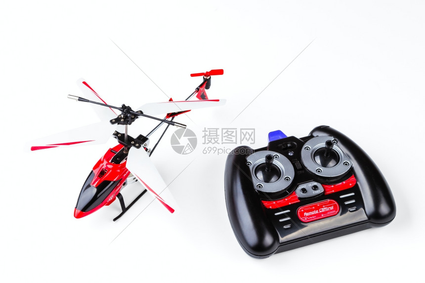 红色的直升机无线电控制的型号面板隔离在白色背景上的控制面板玩具机器图片