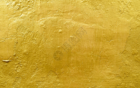 复古的粗糙划痕金色背景或纹理和影子旧墙壁刮痕图片