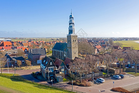 摄影旅游历史的来自荷兰IJsselmeer岛Hindeloopen传统城市的空中飞机图片