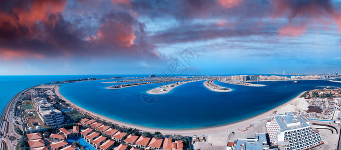 阿拉伯联合酋长国迪拜PalpJumeirah的空中日落全景建筑学著名的土地图片