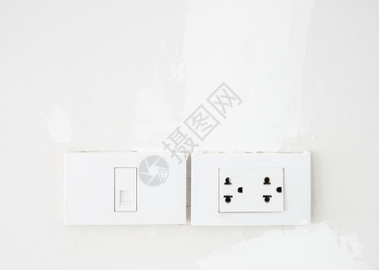 环境的客厅复印空间白墙上的电开关和话插接器细节塑料图片