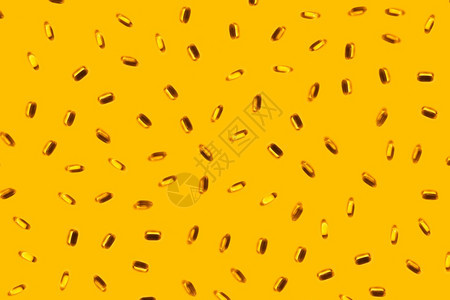 孤立黄色背景的鱼油胶囊黄背景的3号阿梅加丸脂肪肝脏图片