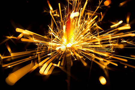 圣诞史派克和新年的对火花闪光灯在黑色圣诞节上新的一年派对火花闪亮灯在黑色烟火魔法闪耀图片