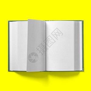 简单的质地透明背回到学校的概念硬封面暗绿书中间的色在黄上被孤立图片