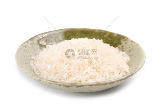 生的碗里孤立白米饭日本人的主要食物有质感的图片