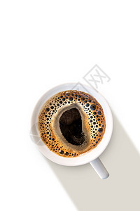 早餐盘子白色背景上有泡的顶层咖啡端视图芳香图片
