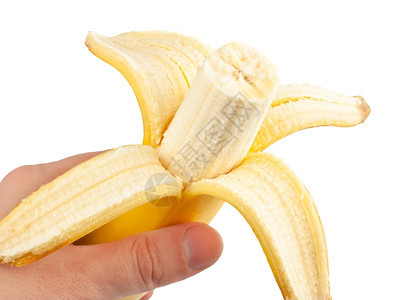 白种人新鲜的手持剥皮香蕉白本底图片
