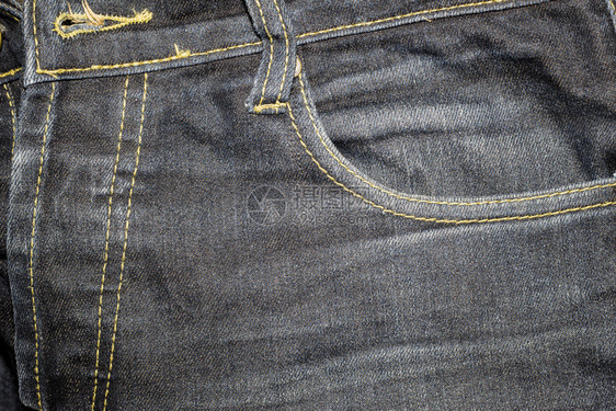 旧牛仔裤的背景纹理有皱和包袋模式磨损接缝老的图片