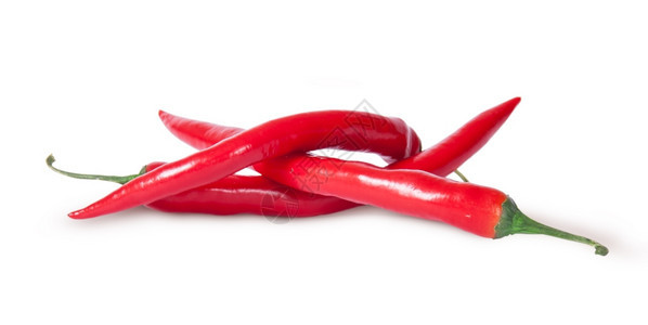 辣椒素三个红色卷白背景的红辣椒目热图片