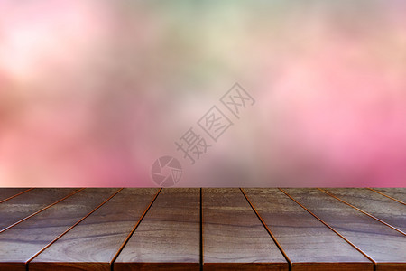 木头空制桌间平台和产品显示缓存的模糊抽象bokoh背景布OKh为了空白的图片