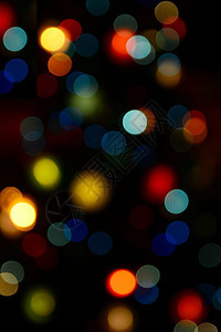 颜色模糊bokeh灯光对圣诞节背景或贺卡有用喜庆的魔法散焦图片