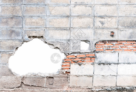 裂缝砖墙上的白洞过时材料垃圾摇滚图片