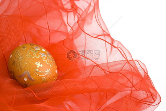 食物概念的传统红丝带面纱装饰的橙色东边鸡蛋图片