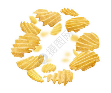 广告铺设脆的带凹槽薯片漂浮在白色背景上带凹槽的薯片漂浮在白色背景上图片