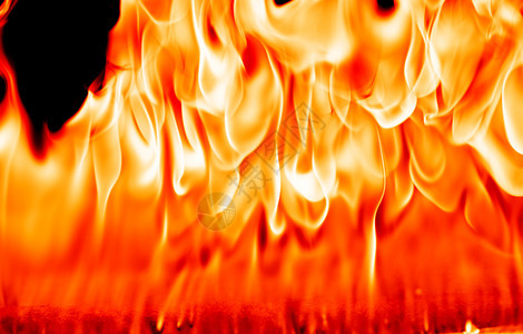 活力抽象艺术黑色背景的火焰燃烧红色热火花上升烈橙光闪耀的飞行粒子篝火接触图片