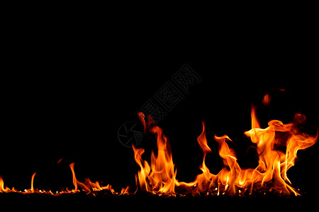 点燃在背景的火焰中燃烧红色热火花升起橙发光的飞行颗粒运动图片