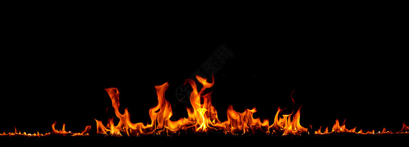 力量红色的抽象在黑背景火焰中燃烧红色热火花升起橙发光的飞行颗粒图片