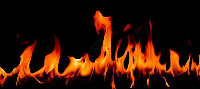 冒险黄色的抽象艺术黑色背景的火焰燃烧红色热火花上升烈橙光闪耀的飞行粒子烧伤图片