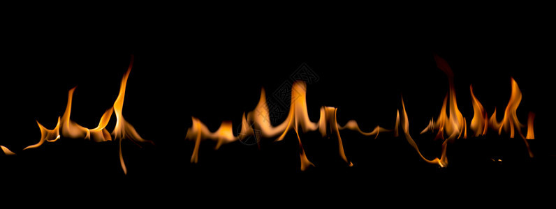 抽象的艺术黑色背景的火焰燃烧红色热火花上升烈橙光闪耀的飞行粒子炽烈辉光图片
