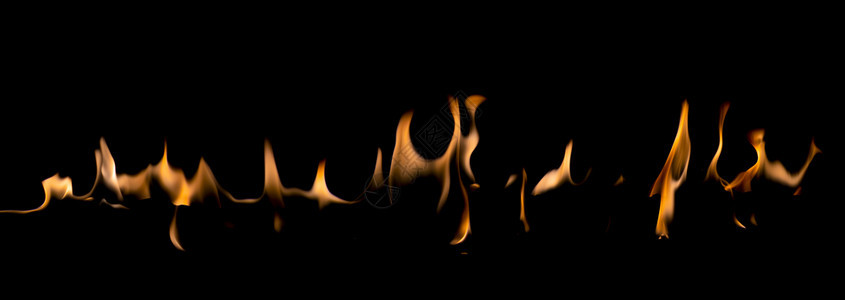 夜晚冒险抽象艺术黑色背景的火焰燃烧红色热火花上升烈橙光闪耀的飞行粒子图片