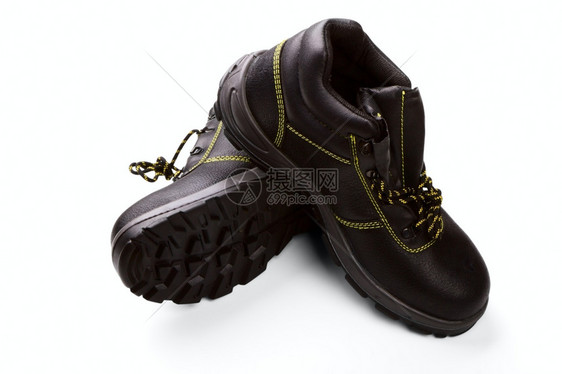 脚丫子黑色工作靴黄线白背景隔离在上鞋带一种图片
