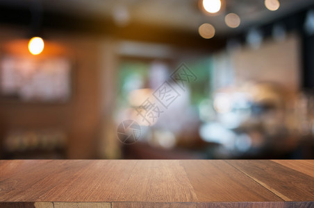 桌子房间在模糊的咖啡厅背景上空木纸桌最佳图片