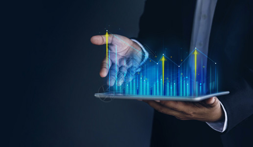 会议技术高利润股票市场商业增长战略规划概念适合现货图案的商人和数字平板电脑图表信息现代的管理图片