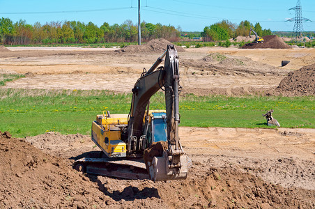 力量桶挖掘机地面机作为铲斗工土方机械在案例中挖掘机作为铲斗工土方机械在案例中挖掘机地面器图片
