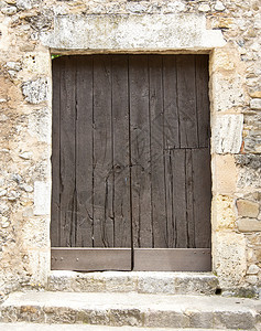 屋木头历史的西班牙古老木制大门图片