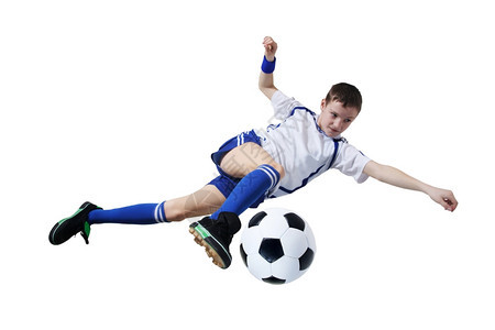 快乐年轻的有足球男孩运动员在白色背景孤立游戏图片