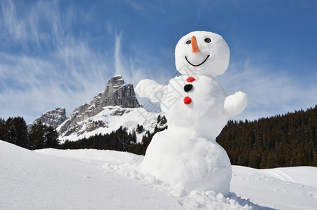 自然霜帽子滑稽雪人对抗瑞士阿尔卑斯山图片