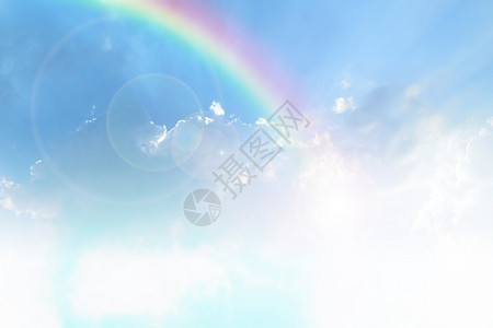 风田园诗般的场景蓝天空和白云有阳光彩虹图片