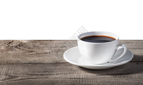 酿造热的在白色背景上被孤立的木制桌上一小杯咖啡店图片