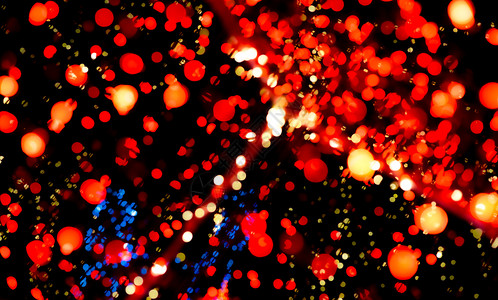 圆圈圣诞快乐新年盛装着红蓝黄色布基背景的灯光和美丽模式在派对圣诞节晚宴夜中突出Xmas光散景夜晚图片