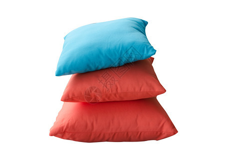 内部的白色背景上隔离的蓝色和红枕头蓬松的装饰图片