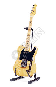 声音电子的木头手持黄色电动吉他白底隔离在色背景上图片
