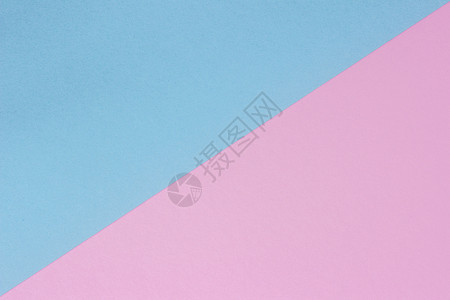 厚重纸质抽象粉色和蓝背景分裂的对角纹理抽象粉色和蓝背景以及语气柔软的颜色图片