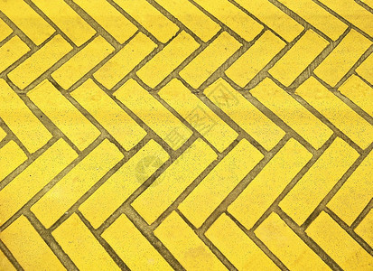 最佳户外旧的黄砖石板地有zigzag模式图案背景用于人行道装饰设计概念带有复制空间的顶视图走道图片